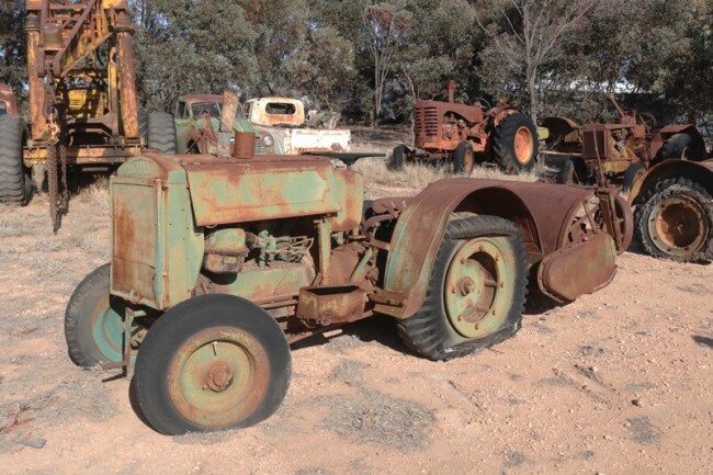 9 Howard DH 22 tractor with Howard rotary hoe attached a