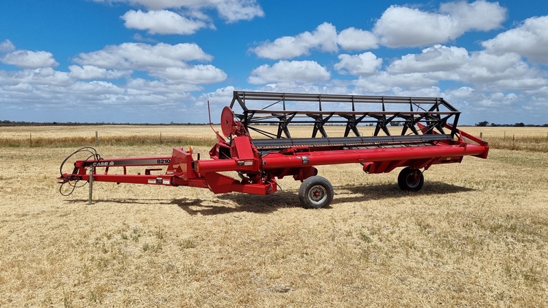 LOT 51 Case IH 8210 Windrower 21ft 1